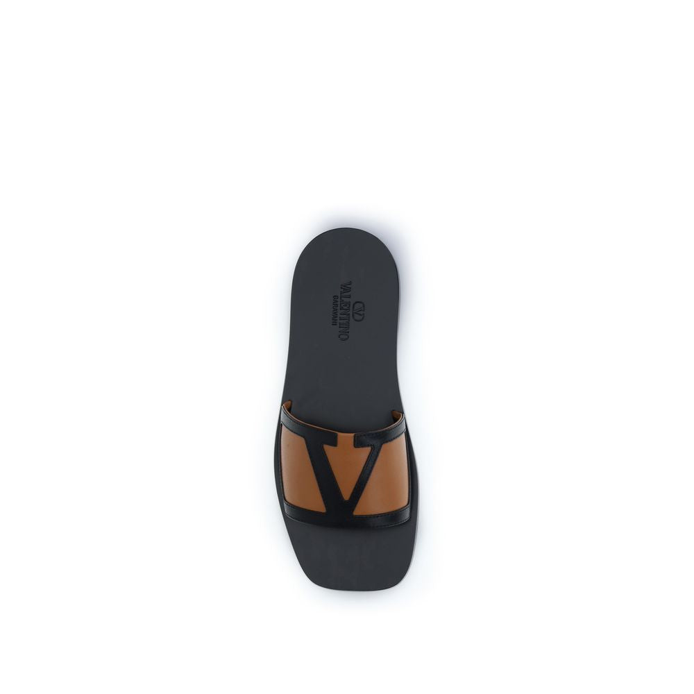 Valentino Garavani Sandales Plates Cuir Noir Modèle Bos Taurus