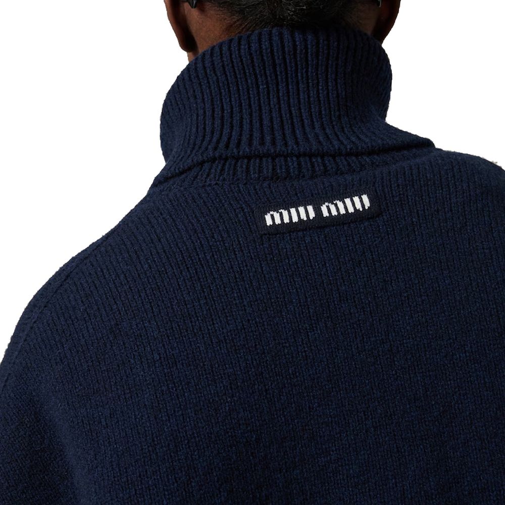 Jersey de cuello alto de cachemira azul de Miu Miu