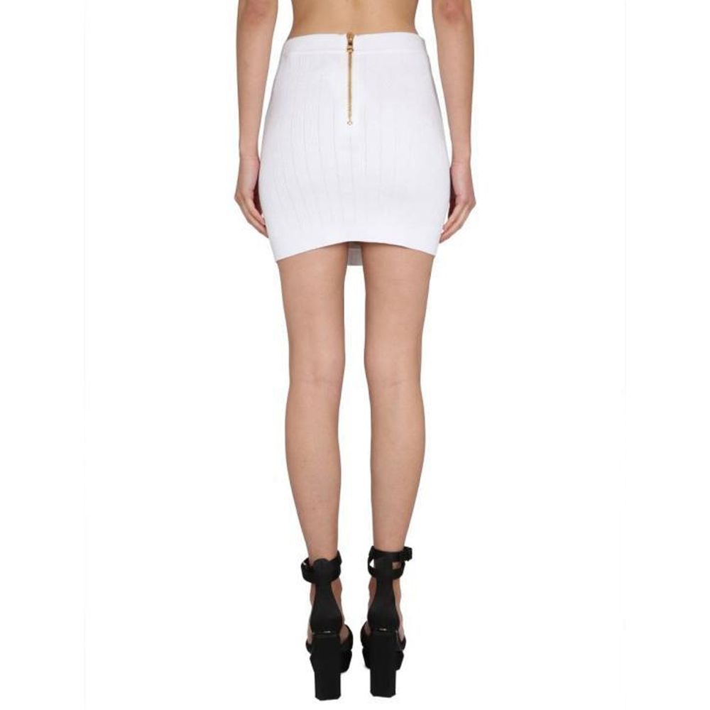 Jupe courte blanche en polyester, tombé fluide, coupe Balmain