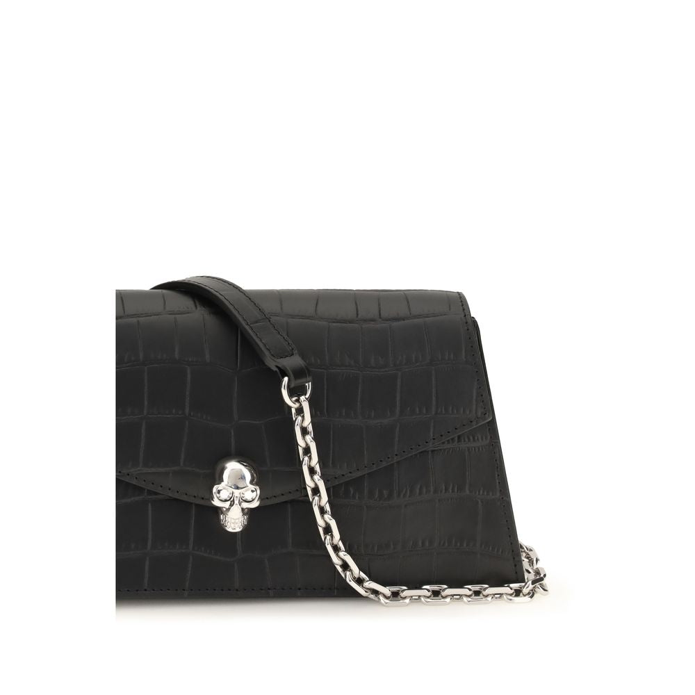 Alexander McQueen Clutch de piel de becerro negra Bos Taurus