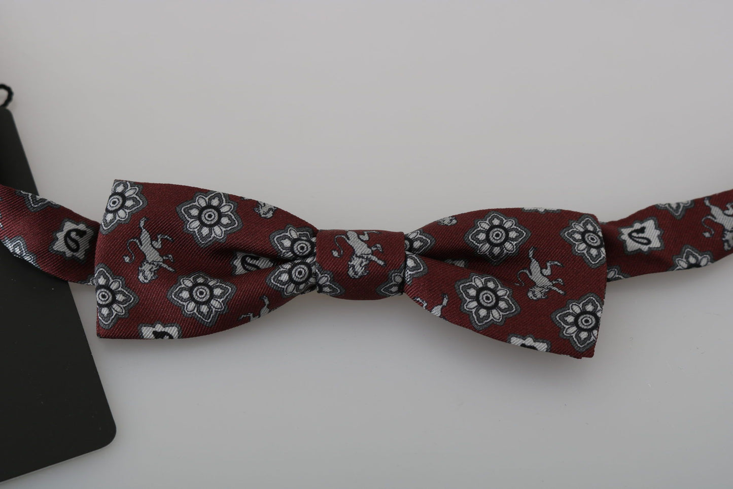 Corbata de moño ajustable de seda granate con león de Dolce & Gabbana para hombre