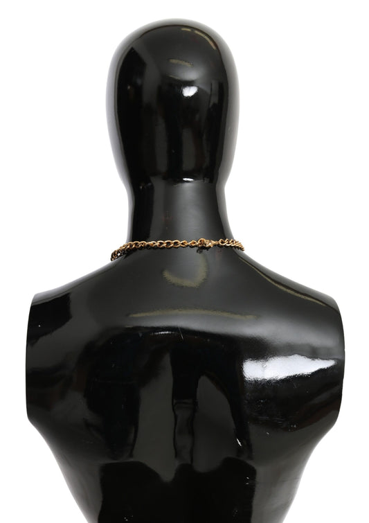 Collar con colgante de flor de cristal de latón dorado y hojas verdes de Dolce & Gabbana
