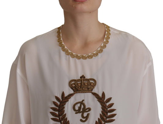 Blusa de seda blanca con corona DG dorada y cristales de Dolce & Gabbana