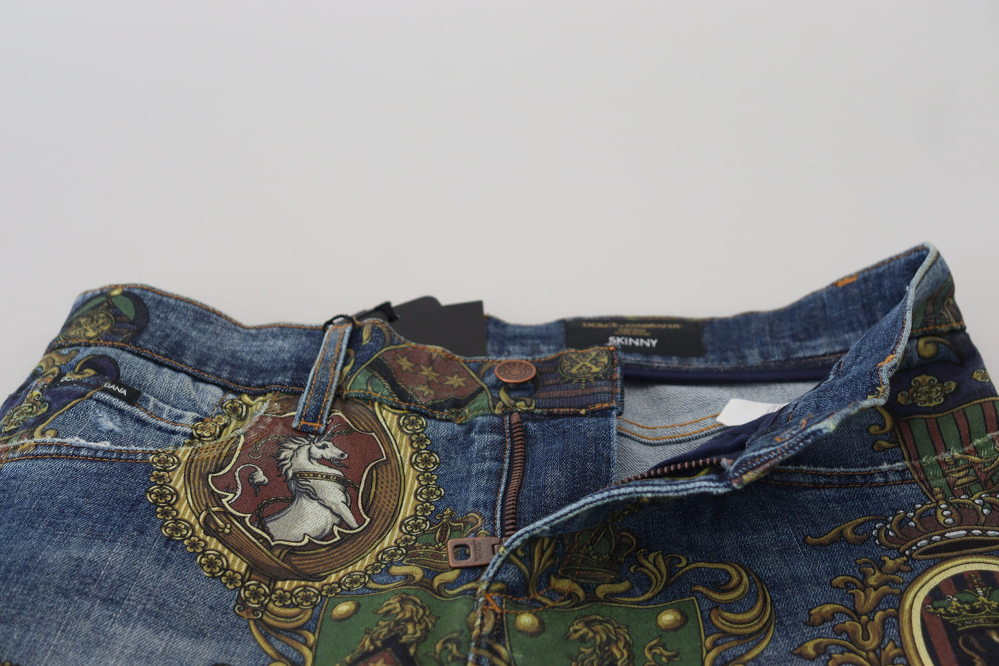 Jeans ajustados de algodón con estampado Medalla Azul de Dolce & Gabbana