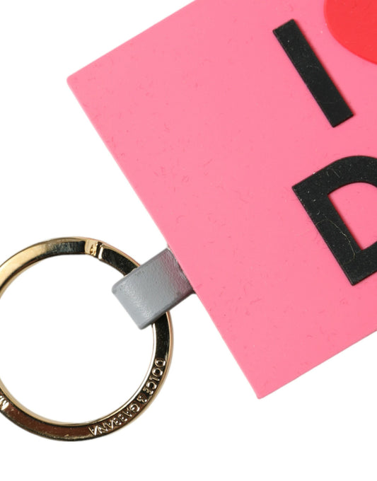 Llavero Dolce & Gabbana de latón dorado con logo DG de silicona rosa