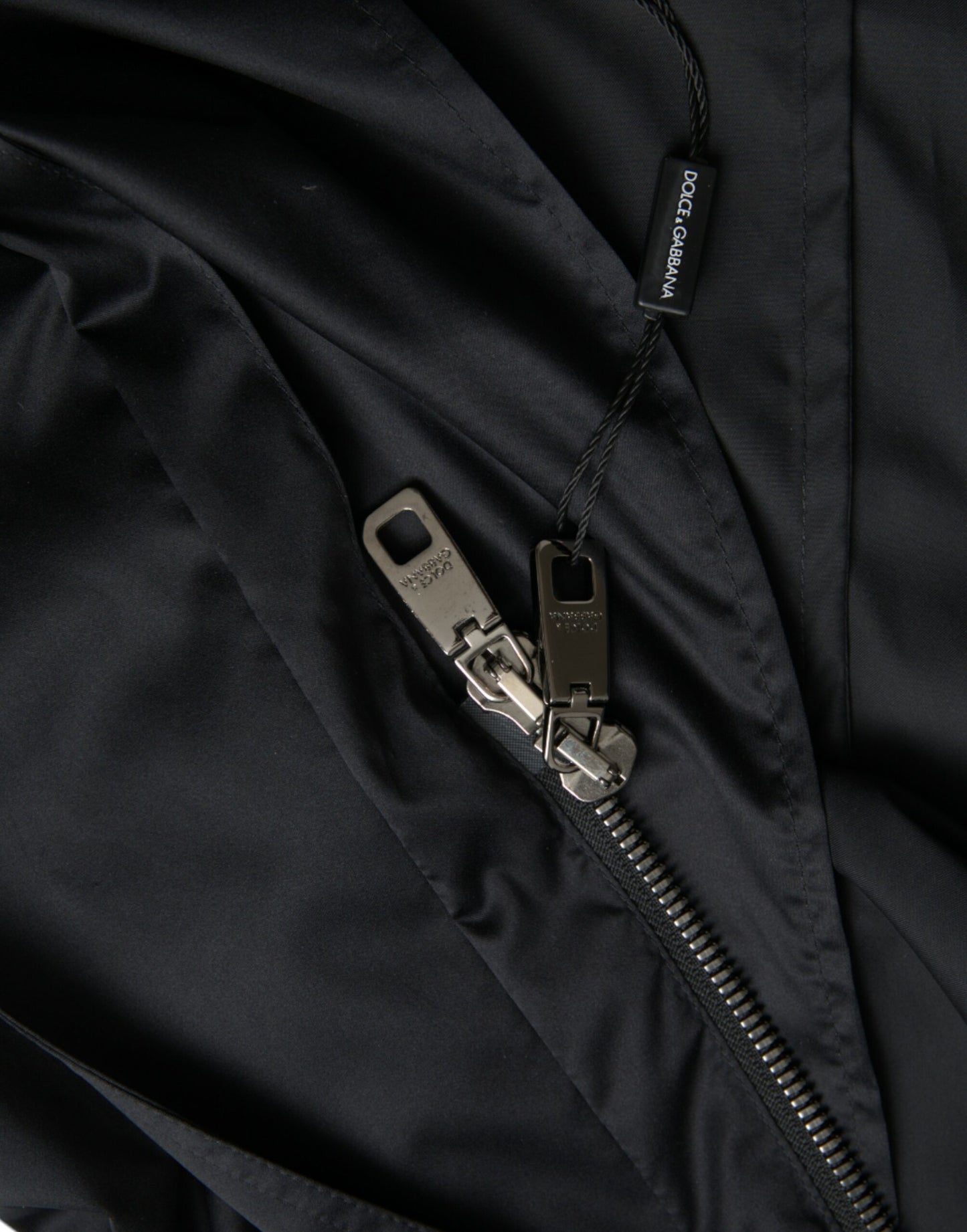 Chaqueta cortavientos larga con capucha de poliéster negra de Dolce & Gabbana