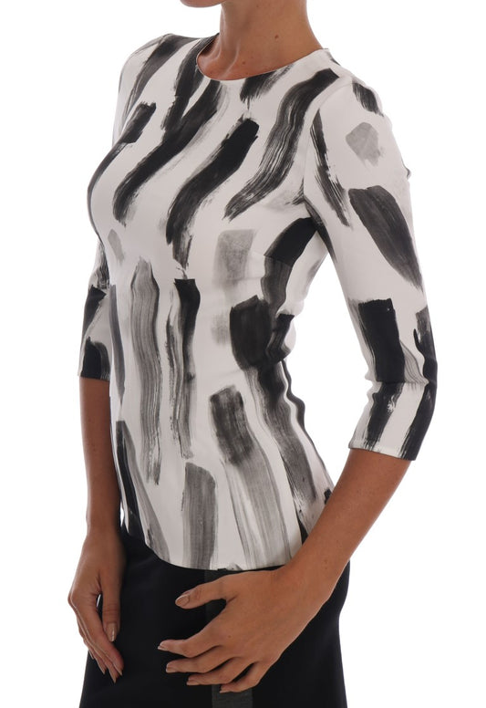 Top blusa con estampado a rayas blancas y negras de Dolce & Gabbana