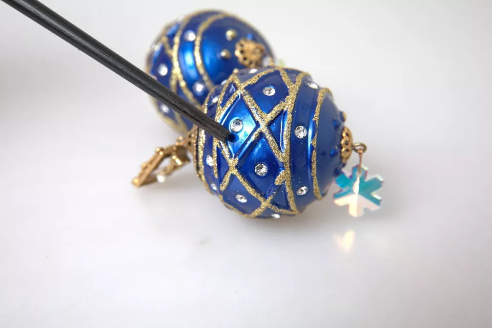 Pendientes de clip de bola de Navidad colgantes de cristal azul de latón dorado Dolce & Gabbana
