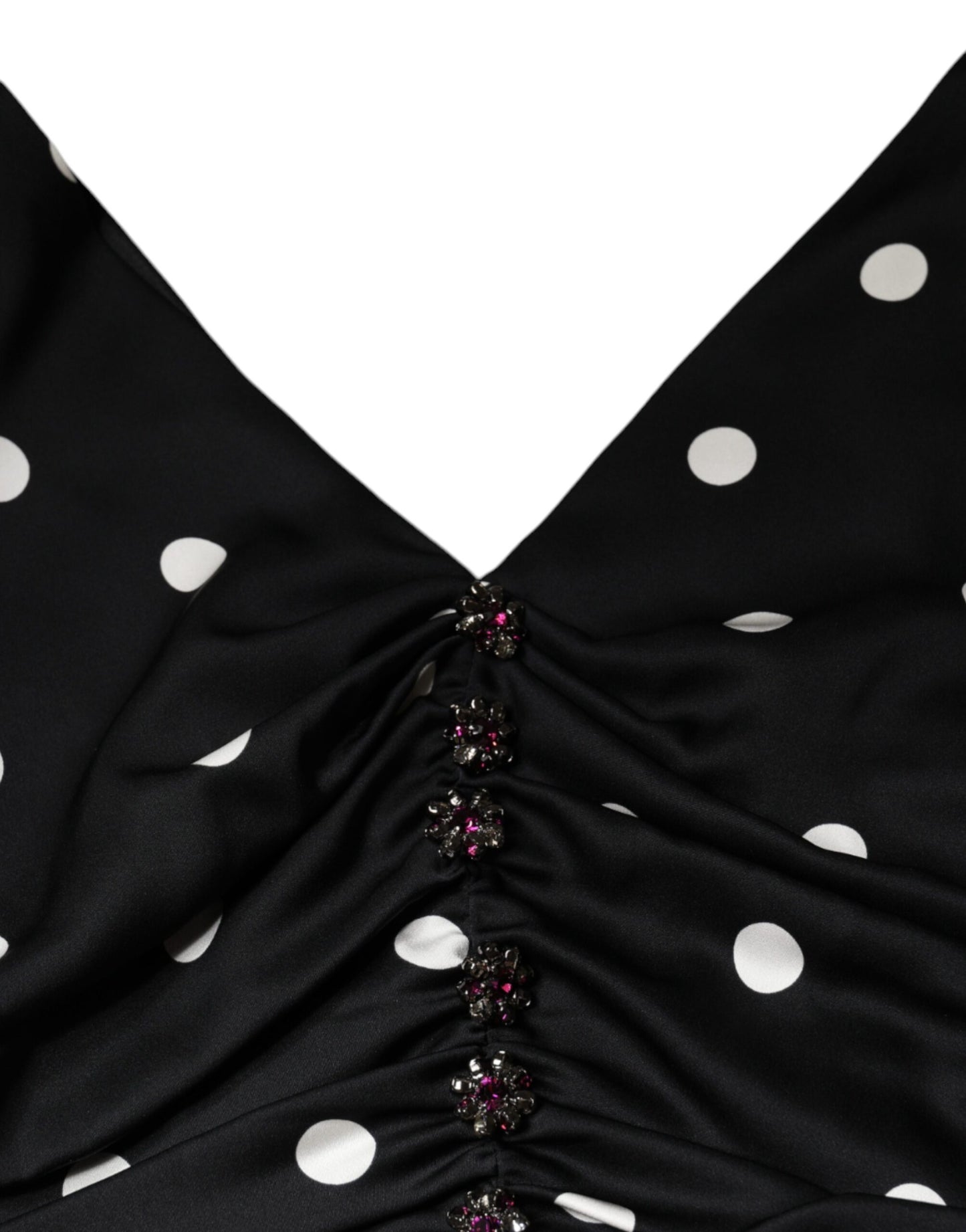 Vestido midi de seda negra con lunares, escote en V y borlas de Dolce & Gabbana