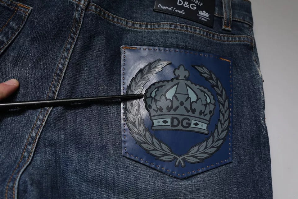 Vaqueros ajustados de algodón con el logotipo DG Crown azul de Dolce & Gabbana