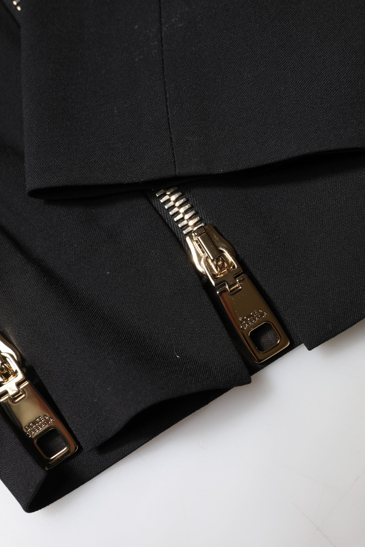 Pantalones de cintura alta cónicos con cremallera de lana negra de Dolce & Gabbana