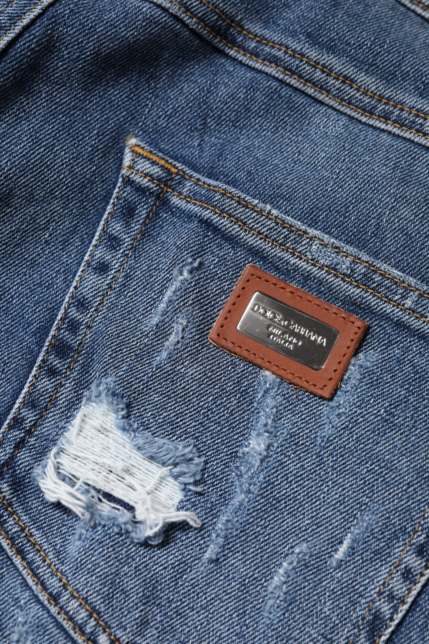 Jeans de mezclilla Dolce & Gabbana de algodón azul desgastado de tiro bajo