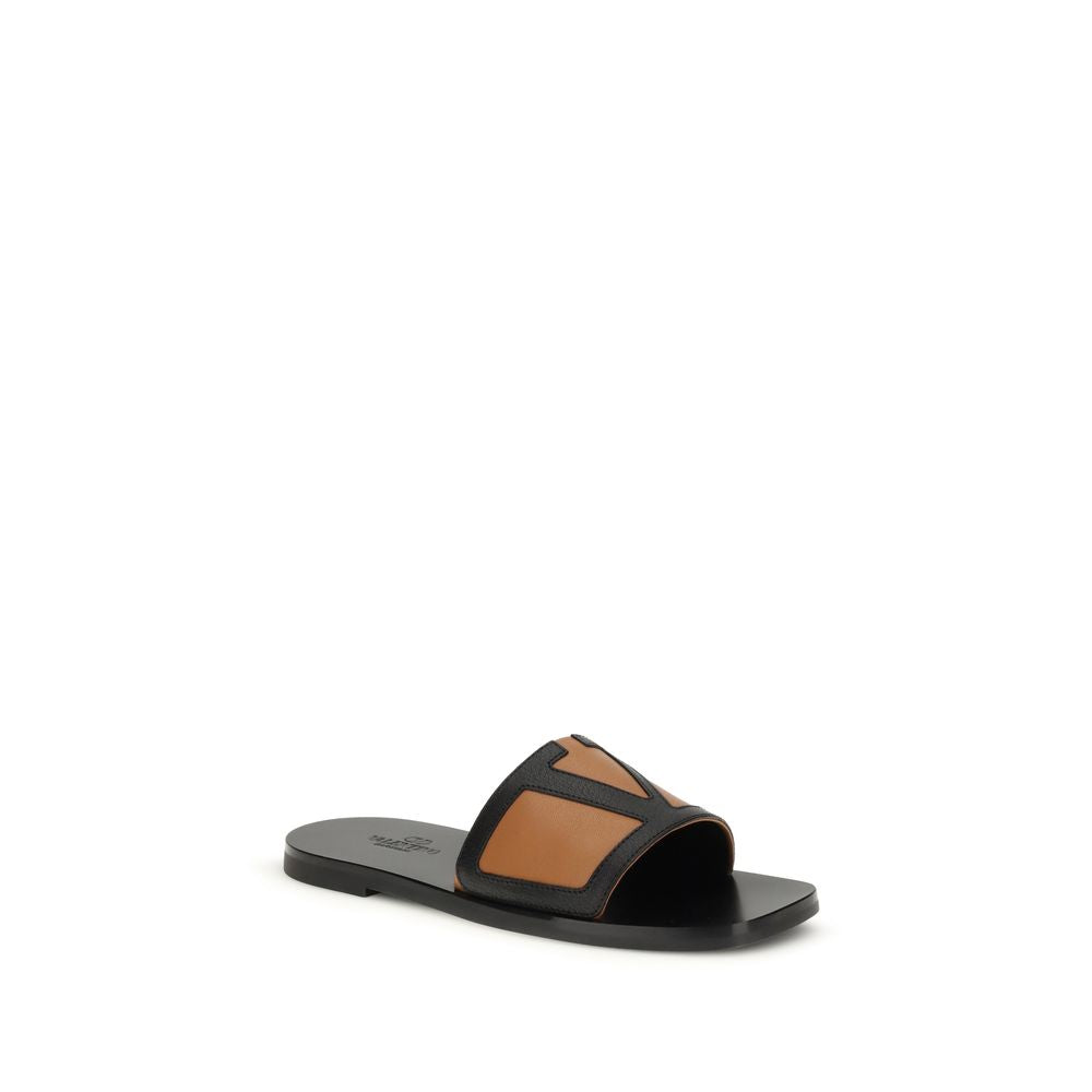 Valentino Garavani Sandales Plates Cuir Noir Modèle Bos Taurus