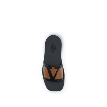Valentino Garavani Sandales Plates Cuir Noir Modèle Bos Taurus