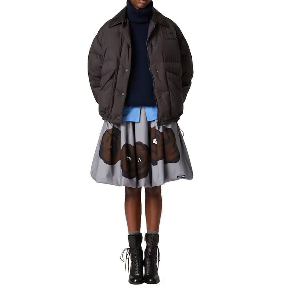 Jersey de cuello alto de cachemira azul de Miu Miu