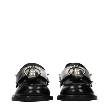 Mocasines sin cordones de cuero negro Prada