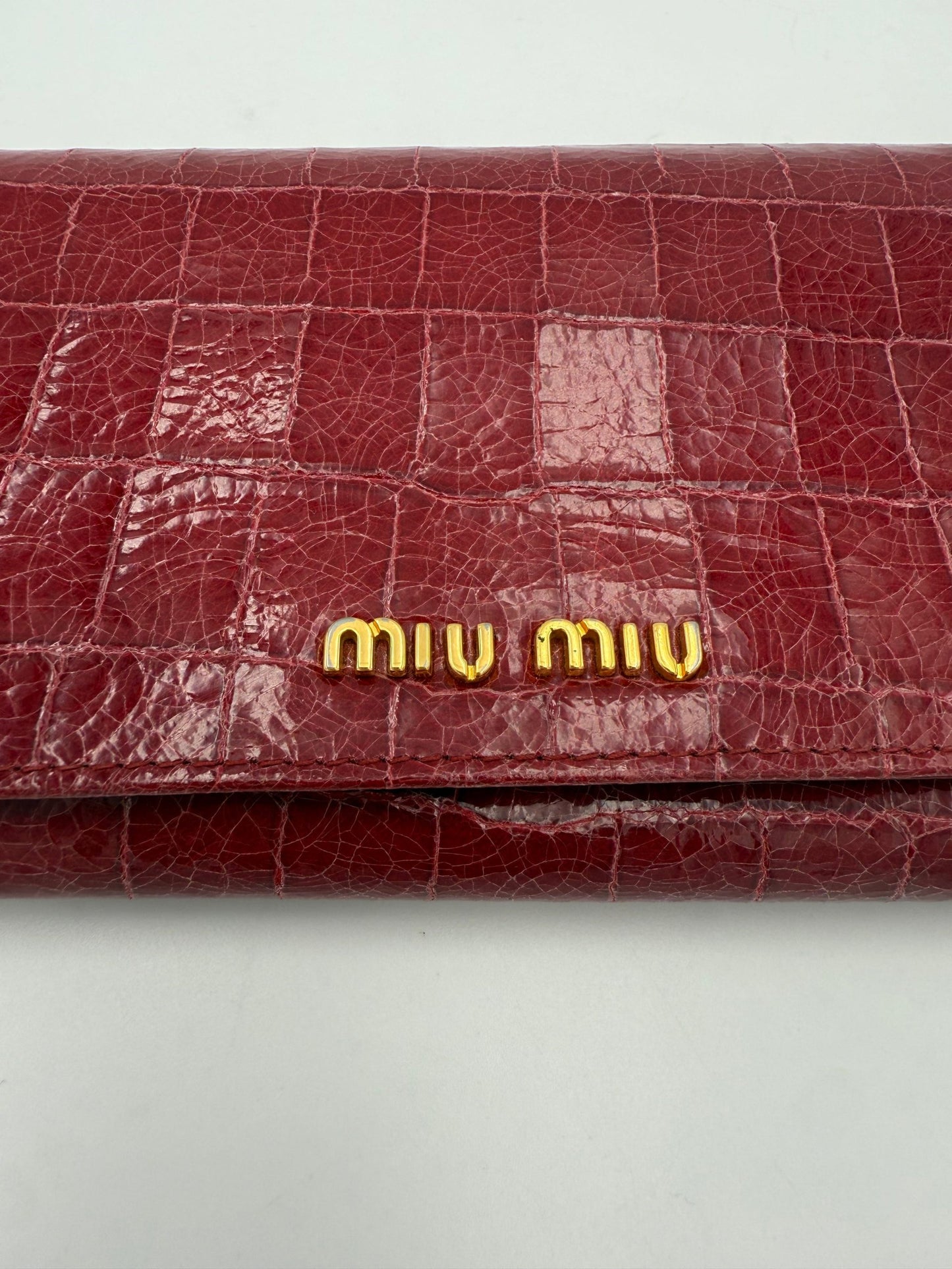 Portefeuille Miu Miu Rouge en Cuir Imprimé Croco