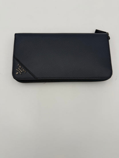 Portefeuille zippé bleu en cuir Saffiano Prada