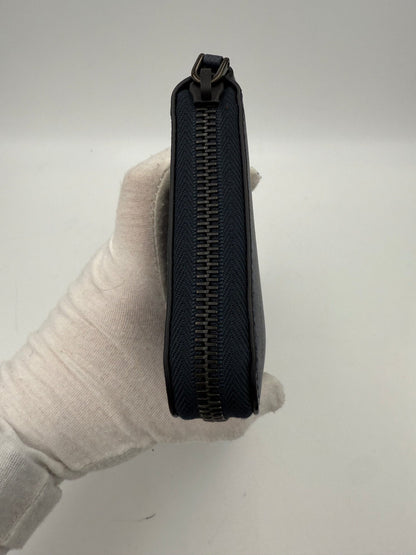 Portefeuille zippé bleu en cuir Saffiano Prada
