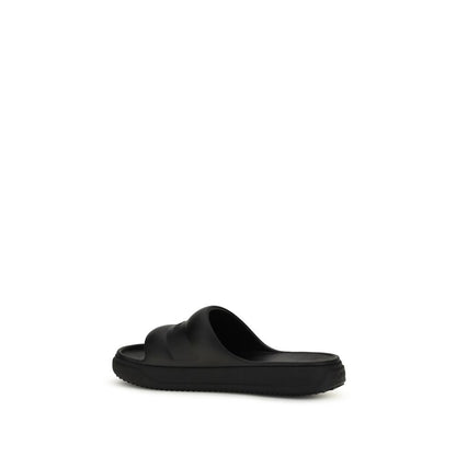 Sandalias planas de goma negras Moncler