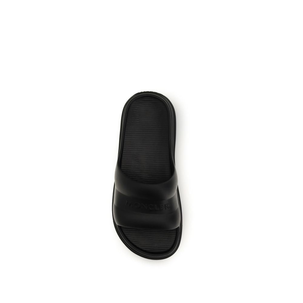 Sandalias planas de goma negras Moncler