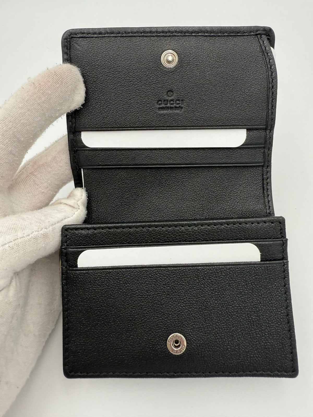 Portefeuille compact Gucci modèle GG Blondie en noir