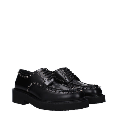 Zapatos Oxford y Derby Valentino Garavani de cuero negro