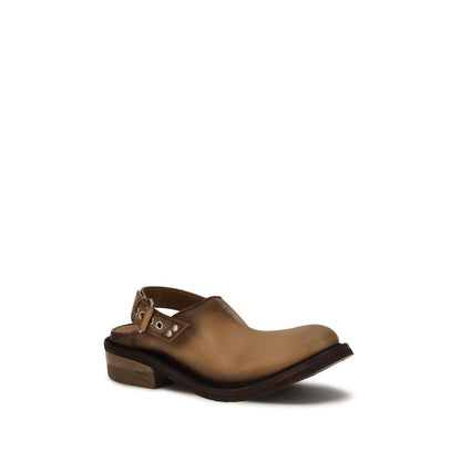 Mules Miu Miu en cuir de veau marron, modèle Bos Taurus