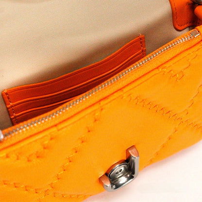 Sac bandoulière convertible Marc Jacobs The J Marc Mini en cuir matelassé Scorched