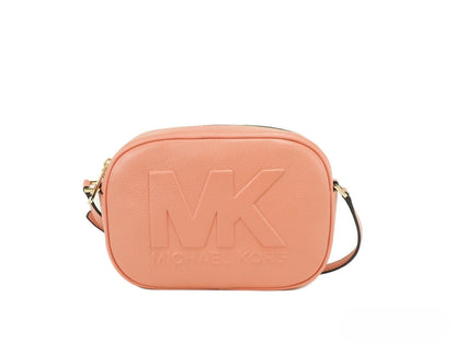 Bolso cruzado Michael Kors Jet Set Travel mediano de cuero Sherbert con forma ovalada tipo cámara