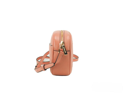 Bolso cruzado Michael Kors Jet Set Travel mediano de cuero Sherbert con forma ovalada tipo cámara