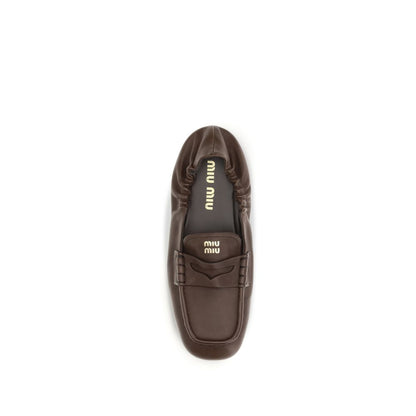 Miu Miu Mocasines sin cordones de piel de cordero Ovis Aries Aries marrones