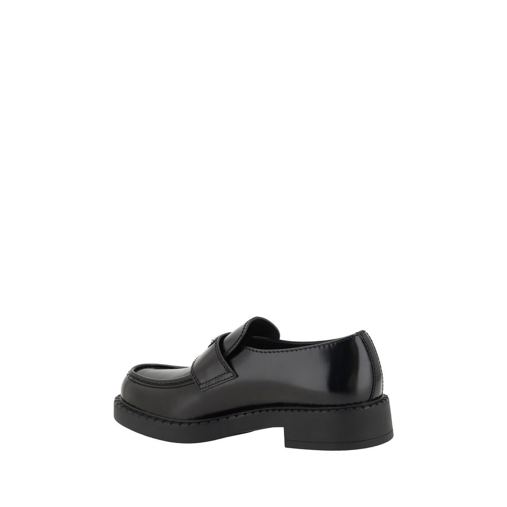 Mocasines de plataforma Prada en piel de becerro negra Bos Taurus