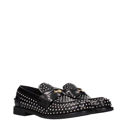 Miu Miu Mocasines sin cordones de cuero negro