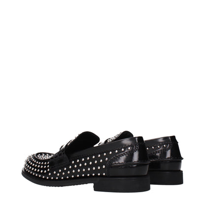 Miu Miu Mocasines sin cordones de cuero negro