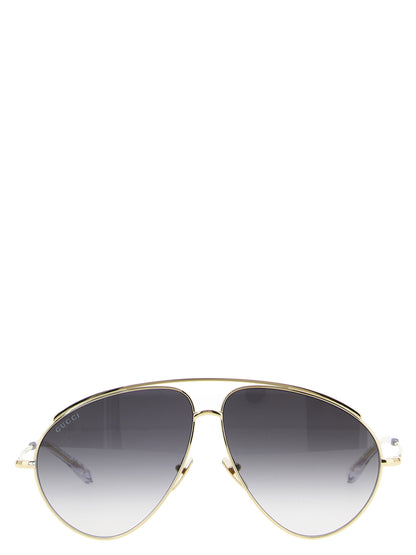 Gafas de sol Gucci de metal dorado