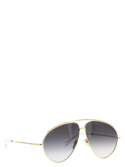 Gafas de sol Gucci de metal dorado