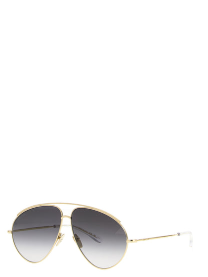 Gafas de sol Gucci de metal dorado