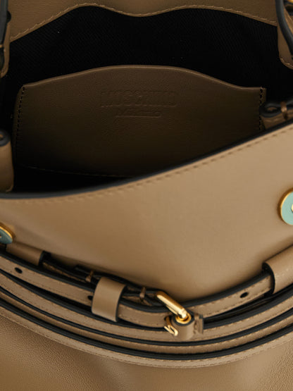 Sac à main Moschino en cuir nappa beige / veau Bos Taurus