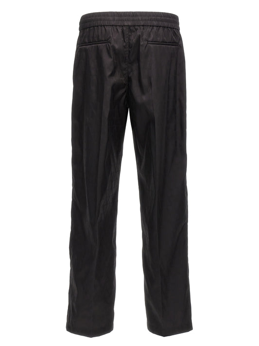 Pantalones casuales Valentino Garavani negros de poliamida