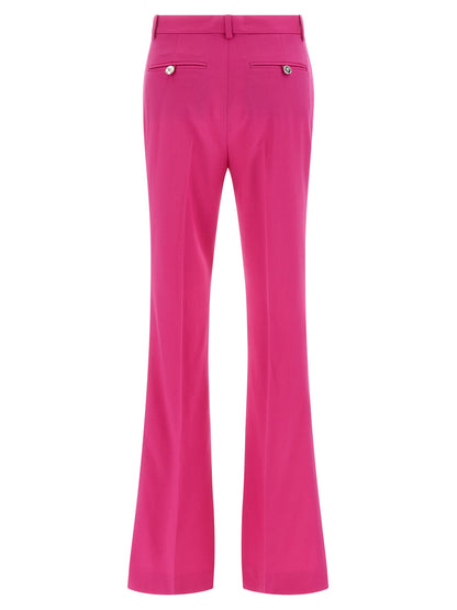Pantalones acampanados Versace de lana virgen fucsia