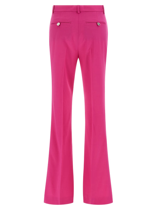 Pantalones acampanados Versace de lana virgen fucsia