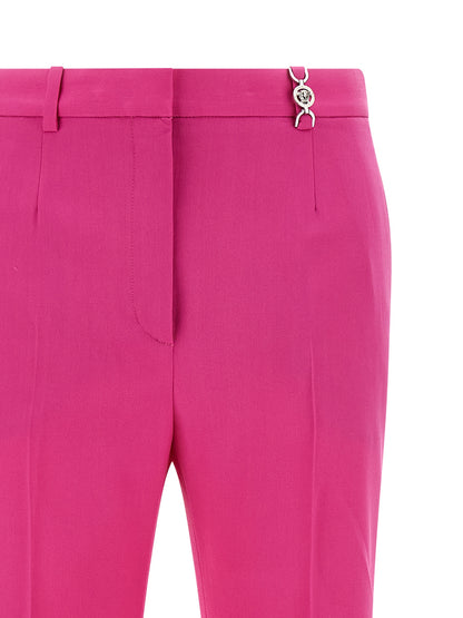 Pantalones acampanados Versace de lana virgen fucsia