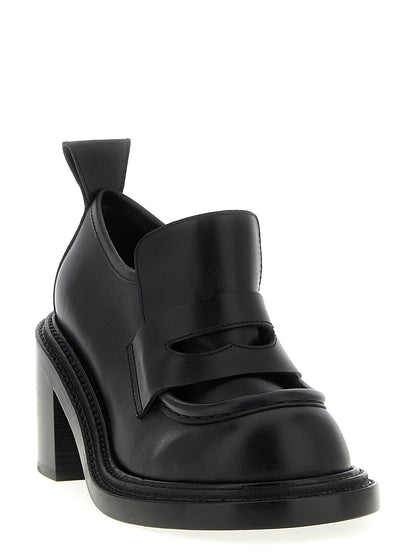 Mocassins à plateforme en cuir noir Moschino
