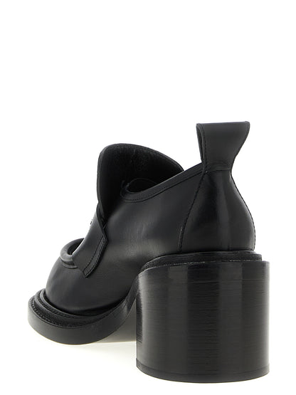 Mocassins à plateforme en cuir noir Moschino