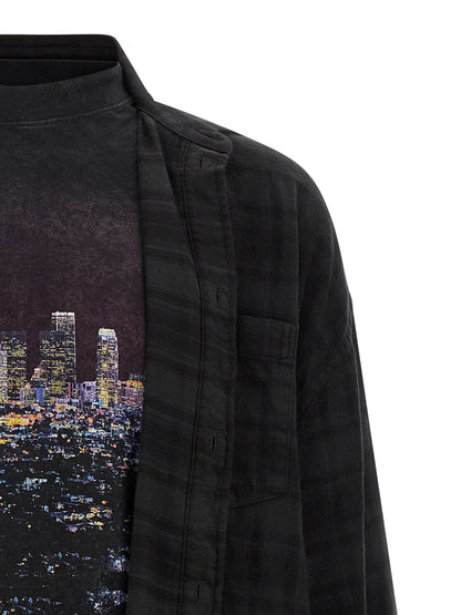 Chemisier Balenciaga en coton noir, design simple et moderne