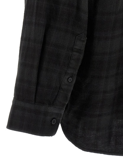Chemisier Balenciaga en coton noir, design simple et moderne