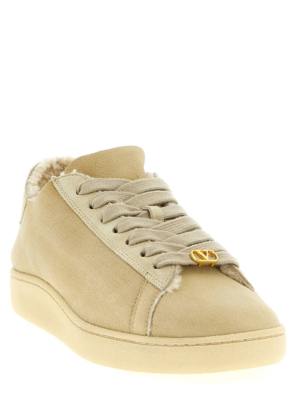 Baskets basses Valentino Garavani en cuir de chèvre beige