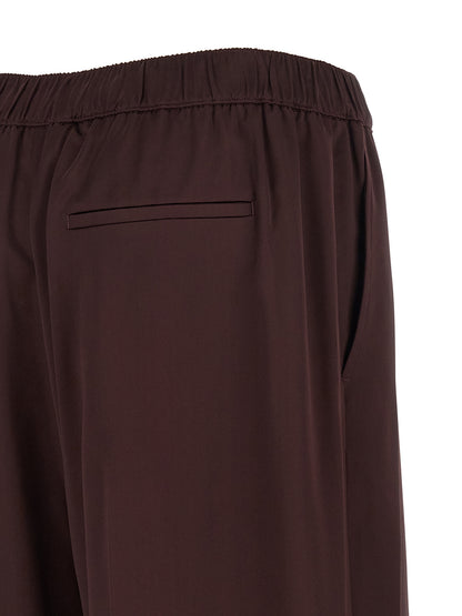 Pantalones informales de viscosa burdeos Tory Burch