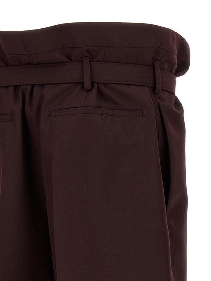 Pantalones informales de lana morados Saint Laurent